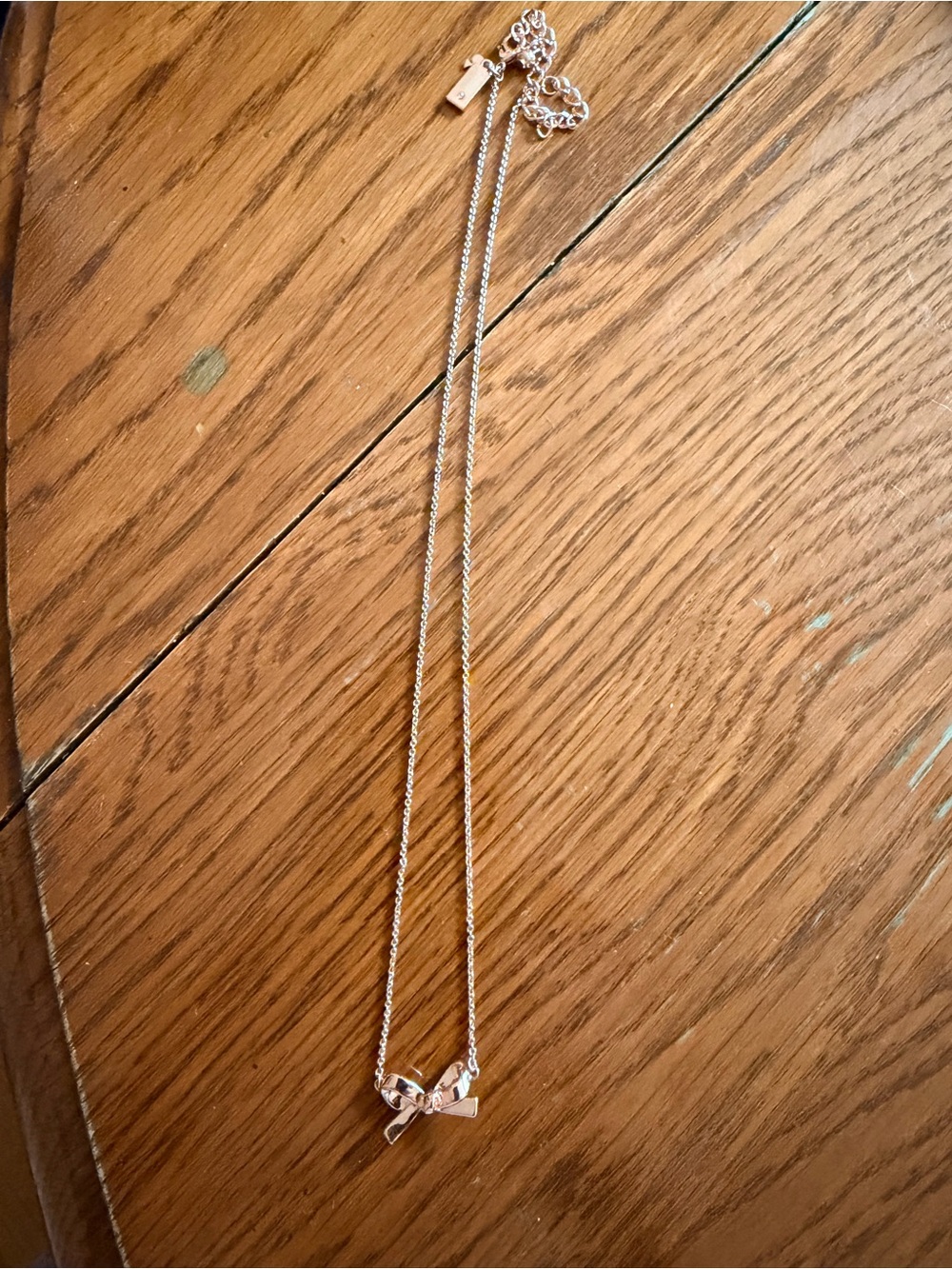 Kate Spade rose gold bow necklace